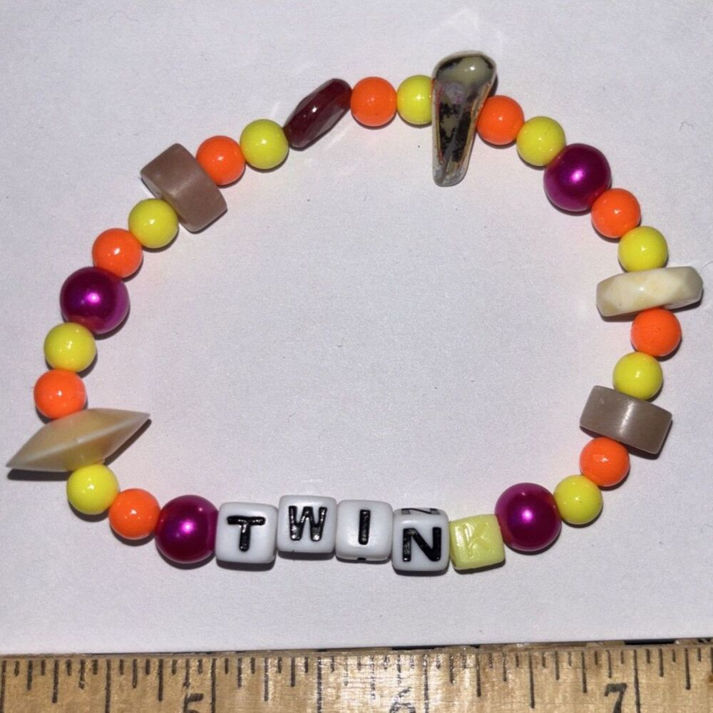 homemade beaded Twink Orange and yellow stretch bracelet handmade adult humor